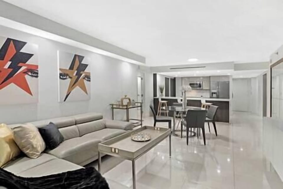 Living room with Roku streaming tv, dining area, fully equipped kitchen