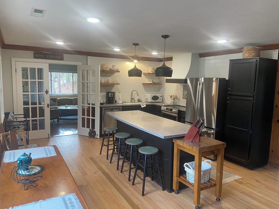 Kitchen Area with TV room entrance.