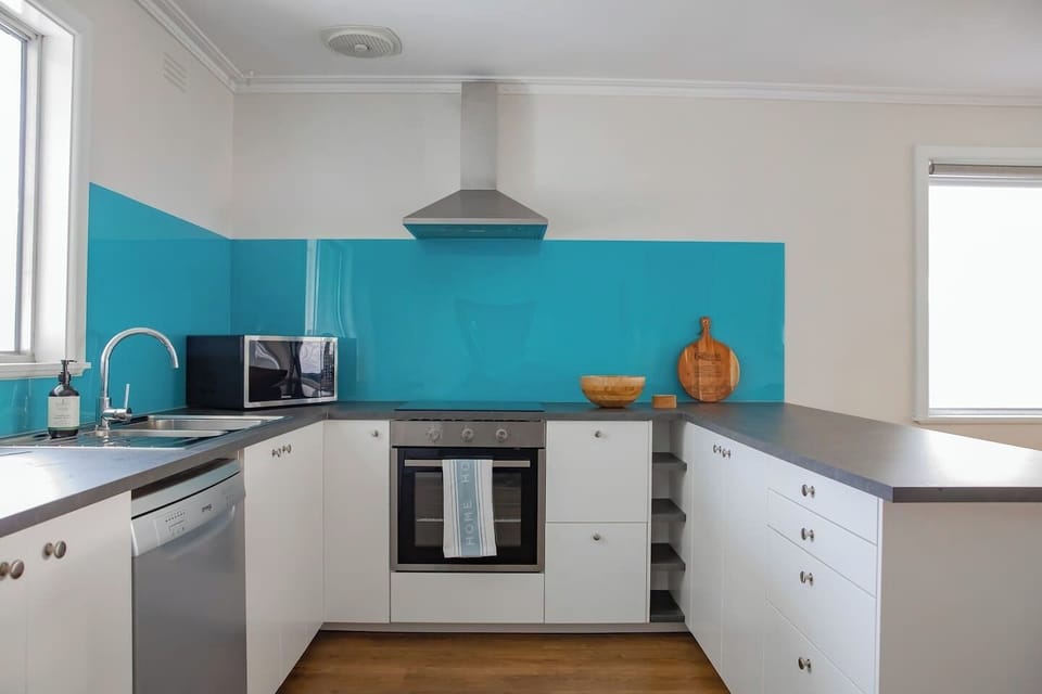 The fully equipped kitchen features a stove, oven, fridge, microwave and dishwasher for easy clean-up.
 
