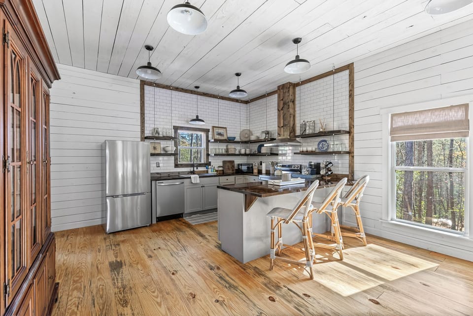Enjoy the fully equipped, modern kitchen and bar.