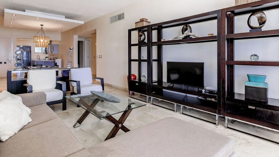 Spacious living areas designed for comfort and connection. Ideal for gathering, relaxing, and enjoying time together after beach-filled days.