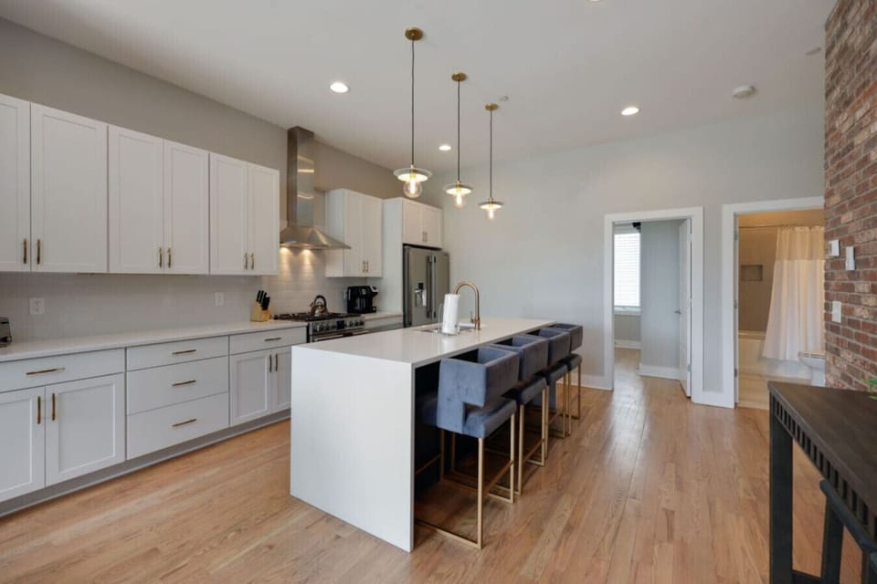 Laundry nook with stacked washer and dryer unit and door