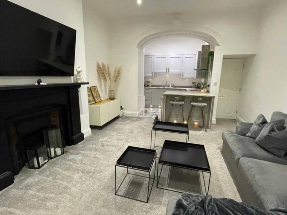 Comfortable Living Space featuring:

- Smart TV with Netflix
- 1 Sofa Bed
- Comfortable seating
- Soft, carpeted floor