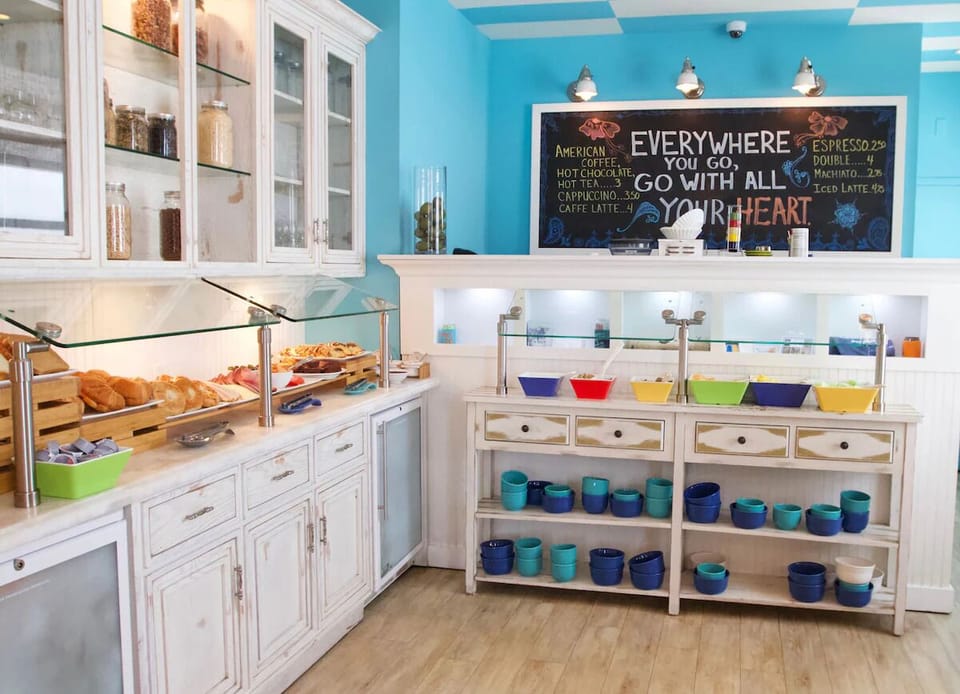 Choose fresh pastries and colorful bites from the bright buffet.