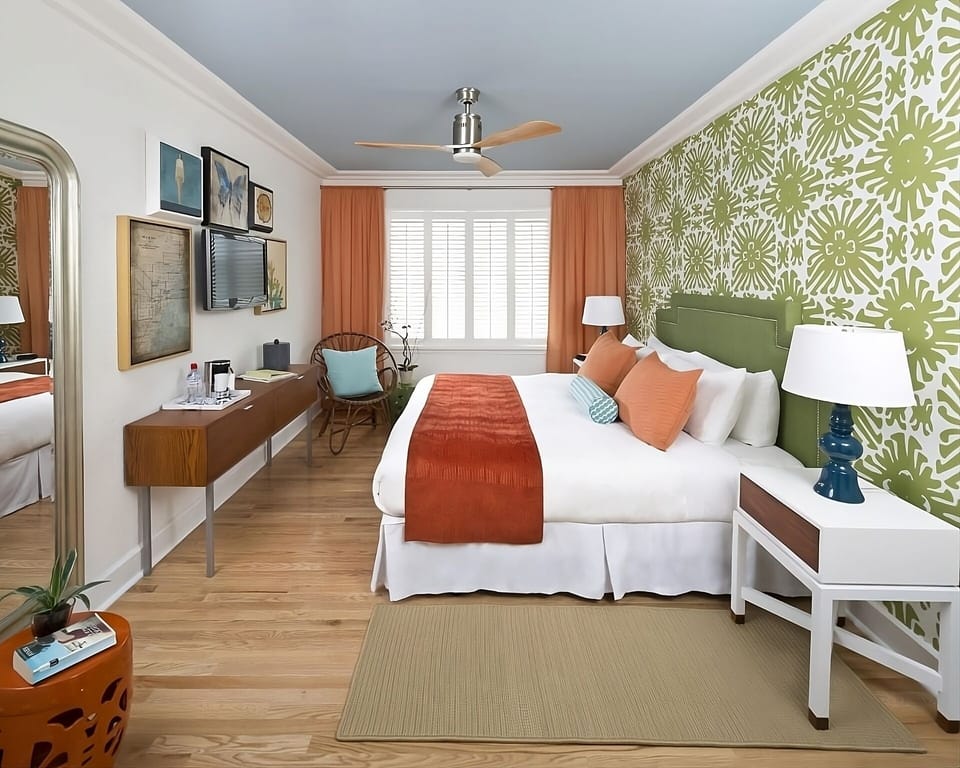 Sink into plush bedding under a quiet, modern ceiling fan.