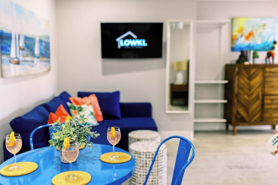 Gather around the dining table for a delightful meal, surrounded by the warmth of home. The living area in the background adds to the cozy ambiance, creating a perfect setting for shared moments and cherished conversations. 