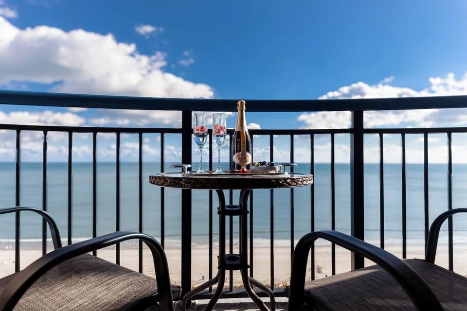 Sip your morning coffee or afternoon wine with a view on our private balcony overlooking the beach!