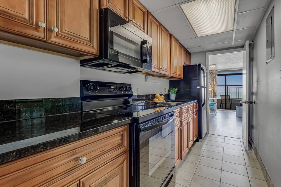 Plan to prepare fresh seafood from local markets, utilizing the kitchen's amenities to create delicious meals inspired by the coastal location.