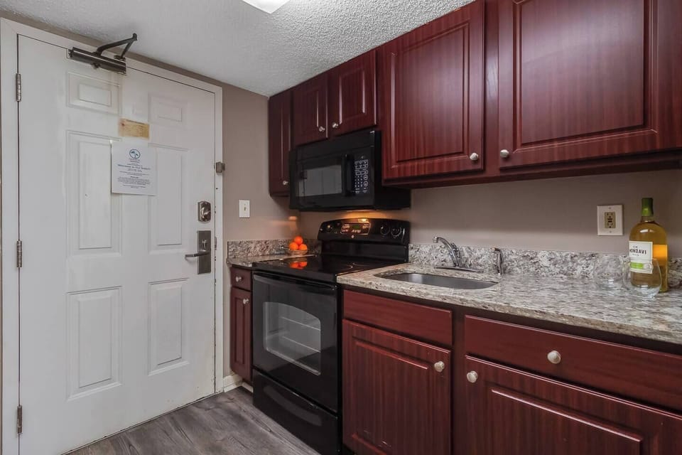 Cook up in our kitchen equipped with necessary appliances!