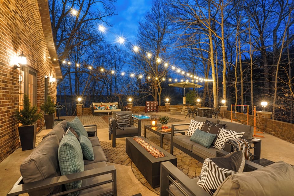 Relax with an outdoor fireplace area, taking in the peaceful vibes.