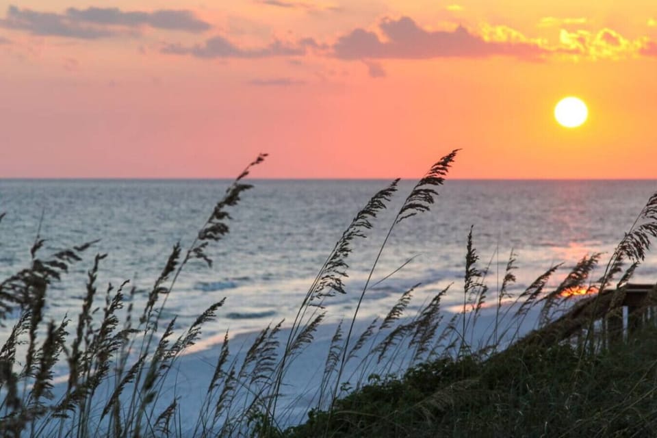 Crystal-clear waters and sunsets! Enjoy swimming, sunbathing, or a peaceful stroll along June White Decker Beach.