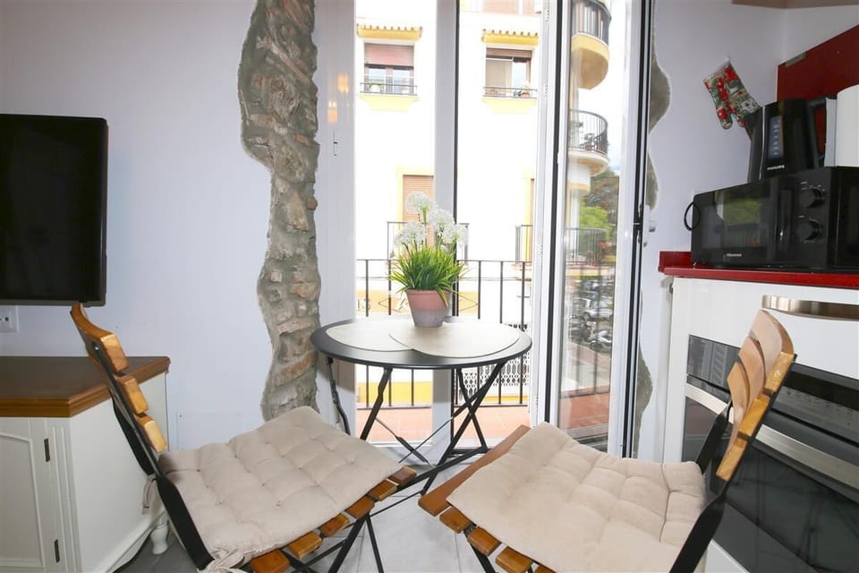 Dining area for two guests on a side of the lounge