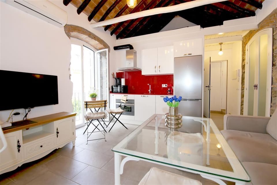 Full view of the lounge area and open kitchen