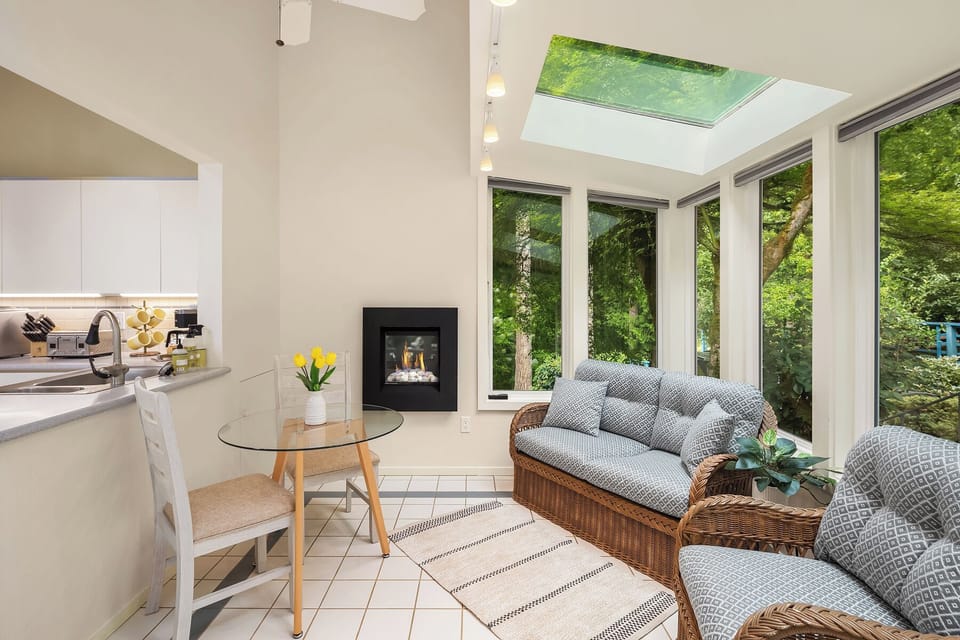 Solarium breakfast nook, reading area, and fireplace