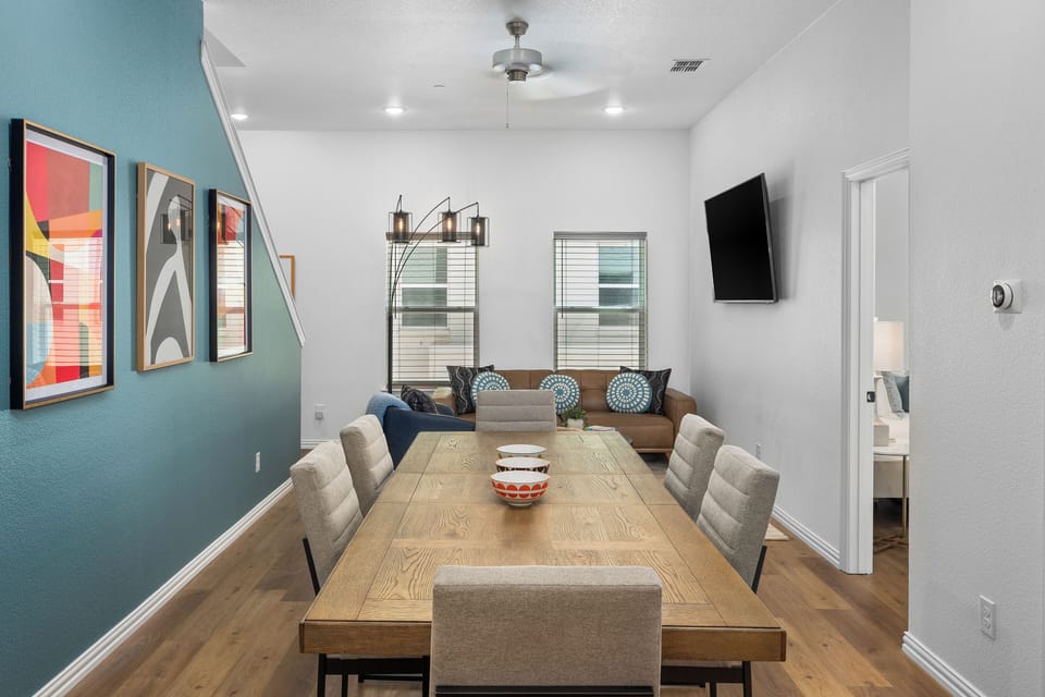 Gather around and eat like you live here. The dining area seats your whole group and flows seamlessly into the full kitchen — ideal for group travel, family stays, and anyone who wants more than a hotel room near Globe Life Field.