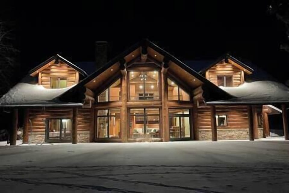 Stunning log cabin on big sand lake!