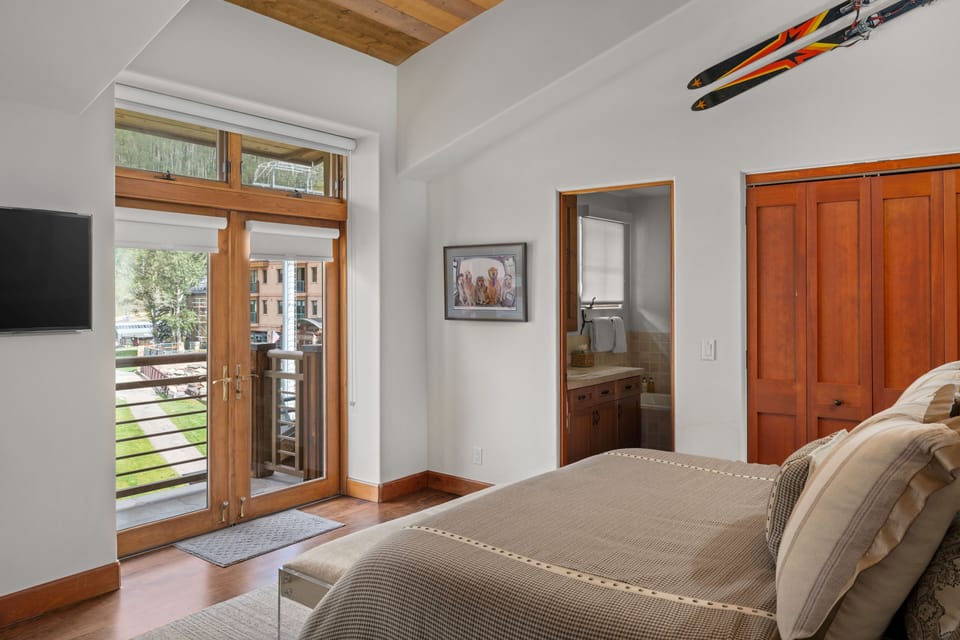 Bedroom 1 - Primary Bedroom - Main Level - Private deck with beautiful sunrise views