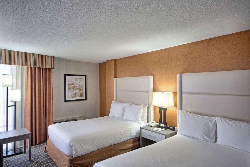 Unit with 2 Double beds. Exact unit will be assigned upon arrival. Views, colors, and decor may vary.