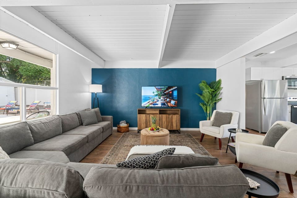 This stunning area features architecturally designed wooden ceilings that add a touch of rustic charm and elegance.