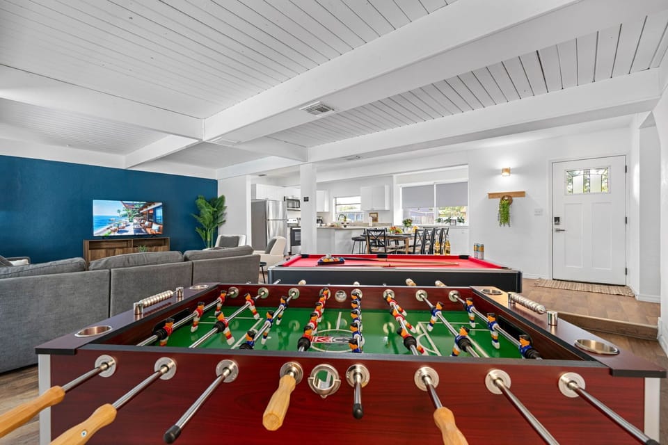 This vibrant area features a beautifully crafted pool table, perfect for both casual games and more serious matches.