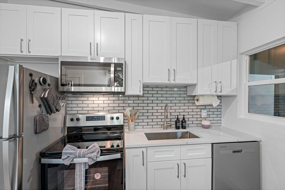 this kitchen is outfitted with all the essentials and more, ensuring a seamless and enjoyable cooking experience.