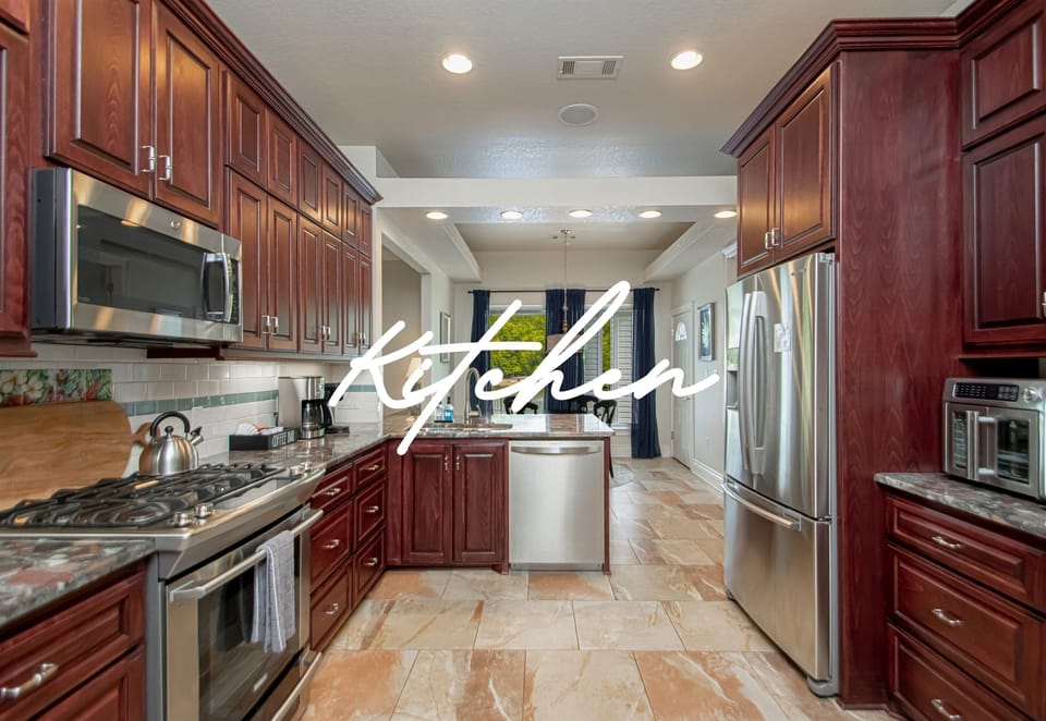 The fully equipped kitchen meets all your culinary needs, with modern appliances and ample counter space.