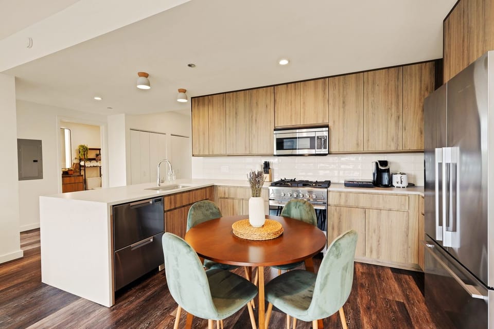 Stylish Dining Area with Velvet Seating and Natural Light in Chicago