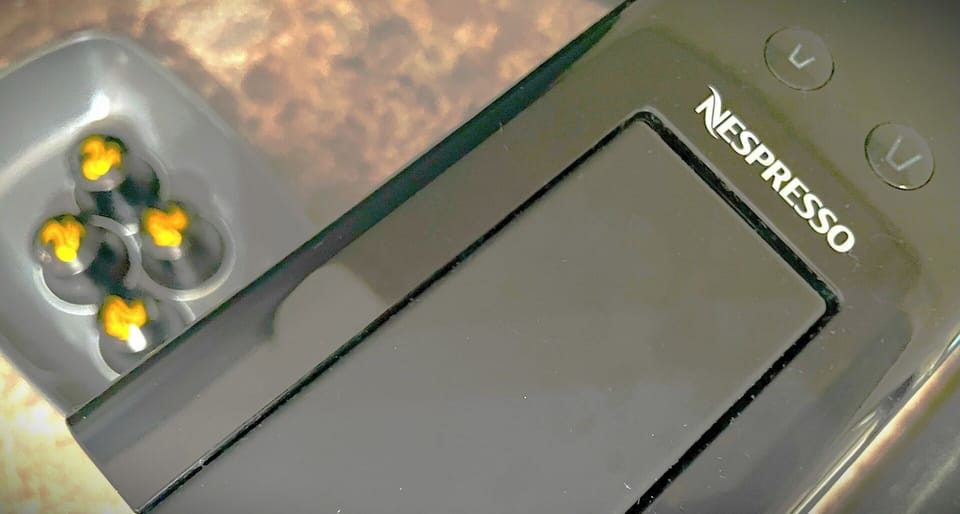 Nespresso coffe machine with capsules