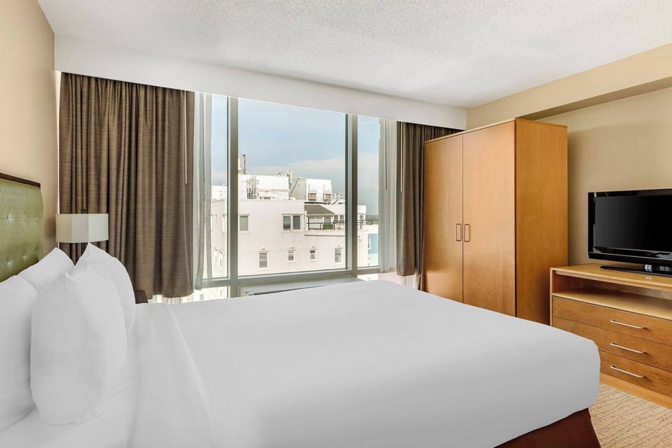 Guest Bedroom features a queen bed.