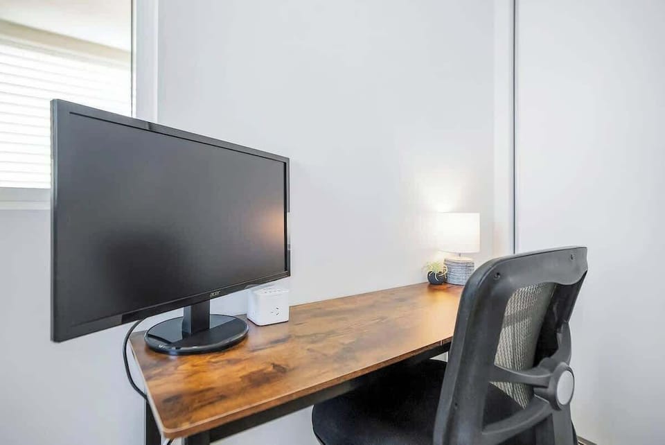 This dedicated workspace in the bedroom is perfect for those working remotely or diving into passion projects. 


