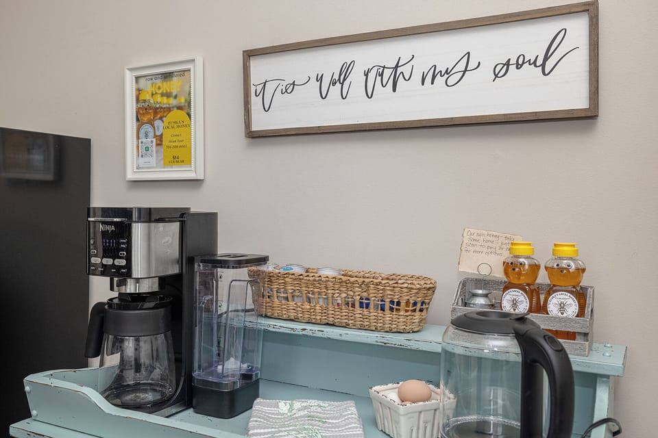 Coffee bar with Kuerig/Drip Duo.  We provide  K-cups, creamers, teas, sugars