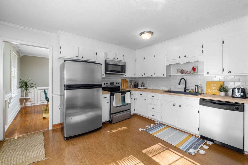Spacious kitchen with parquet flooring