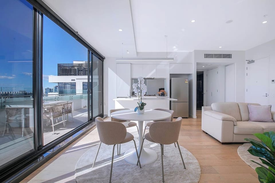 An open, light-filled layout includes a four-seater table to share meals around when you’re not dining out. 
