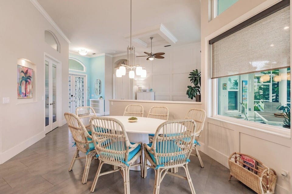 Dining Area: Bright and airy space with chic rattan chairs—perfect for family feasts!