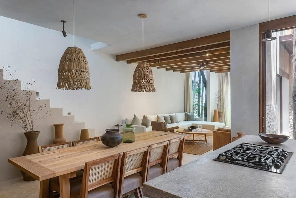 Ground floor with kitchen, dining area, and living room.