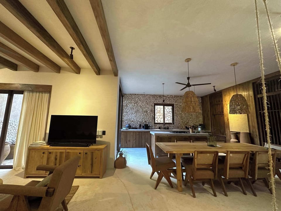 Ground floor with living room, dining room, and kitchen.