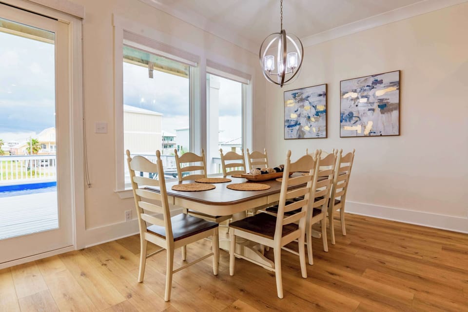 Gather for meals at the dining table, with seating for 8