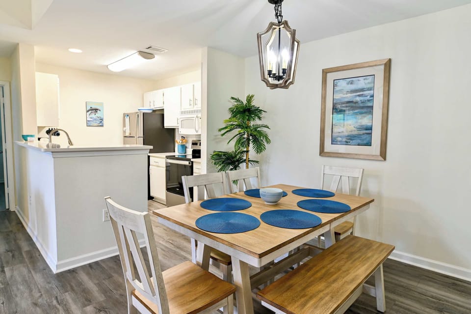 Dining area with table and seating for 6