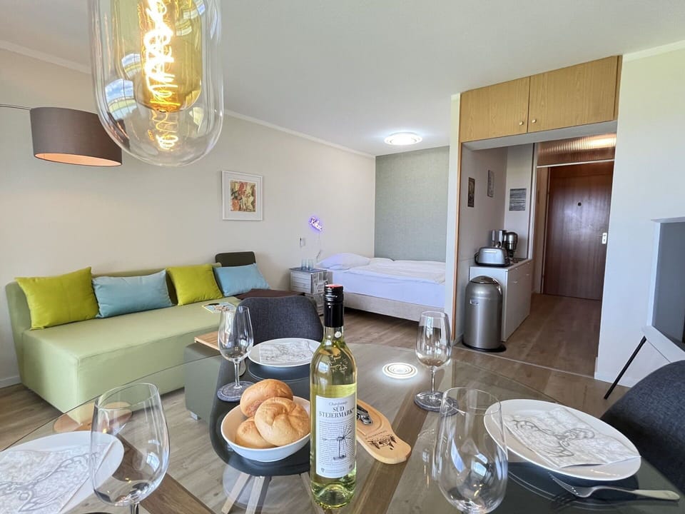 Table, Furniture, Property, Tableware, Interior Design, Couch, Bottle, Comfort, Chair, Floor