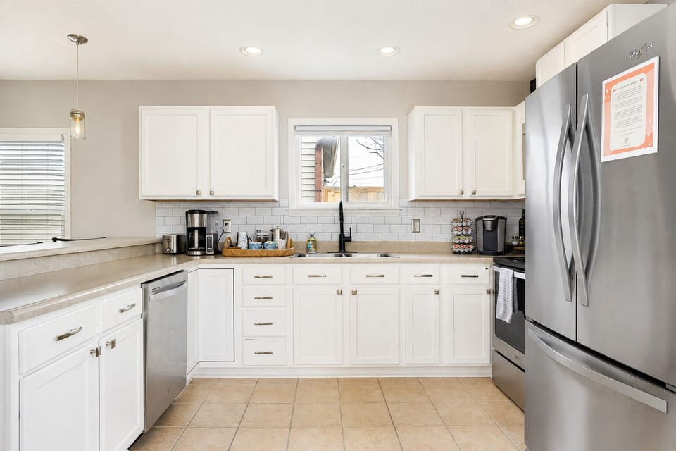 Bright modern kitchen with stainless appliances and ample counter space