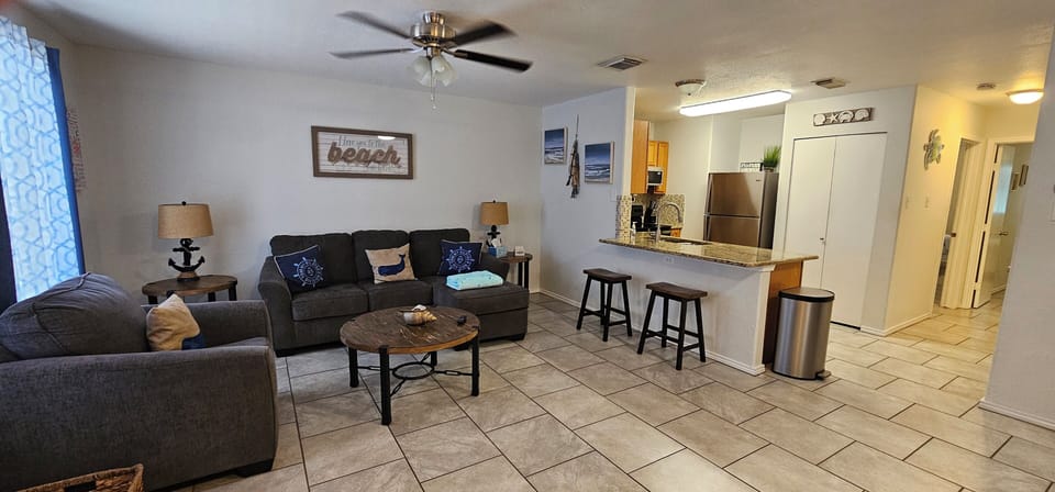 Open concept, living, dining, and kitchen.  Extra seating at the bar.