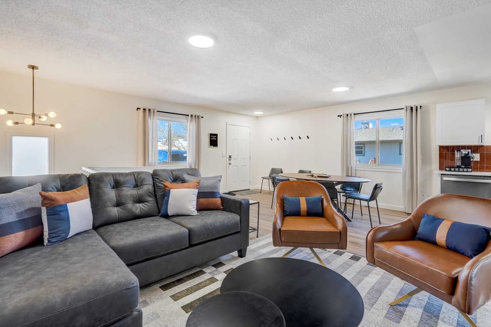 Experience seamless living in our open-concept space, where the dining area seamlessly transitions into the cozy comfort of the living room. From shared meals to relaxing evenings, every moment is enhanced by the warmth of togetherness. Welcome to your perfect blend of style and functionality!