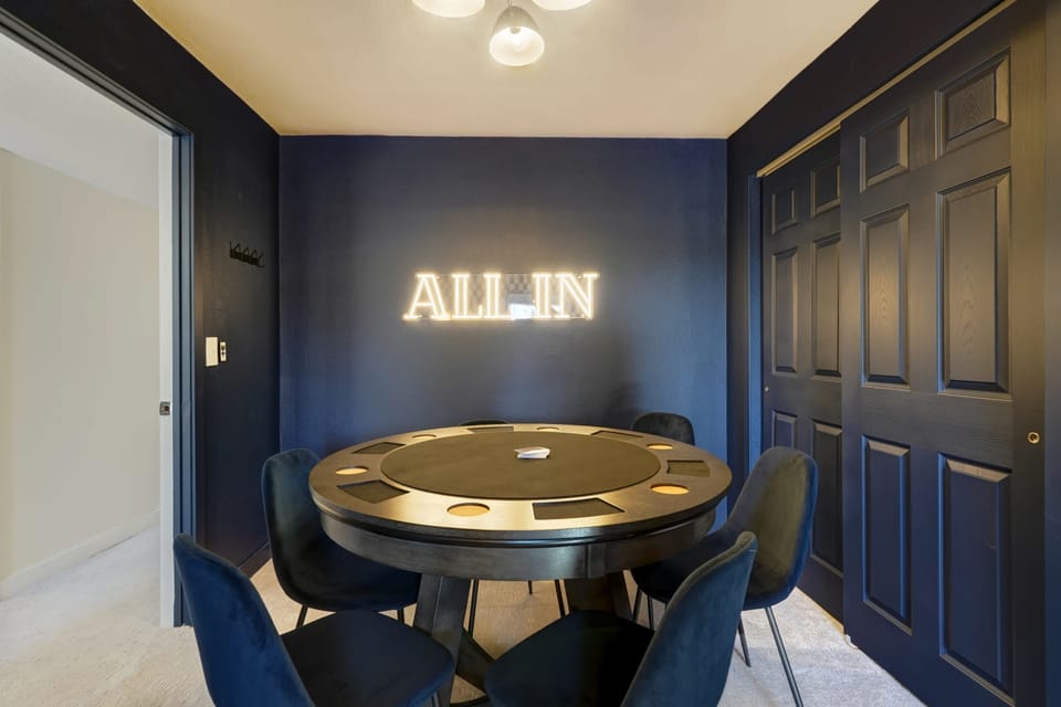 Ante up and indulge in some friendly competition in our game room! Our sleek poker table awaits your next thrilling hand. Ready to shuffle up and deal.?