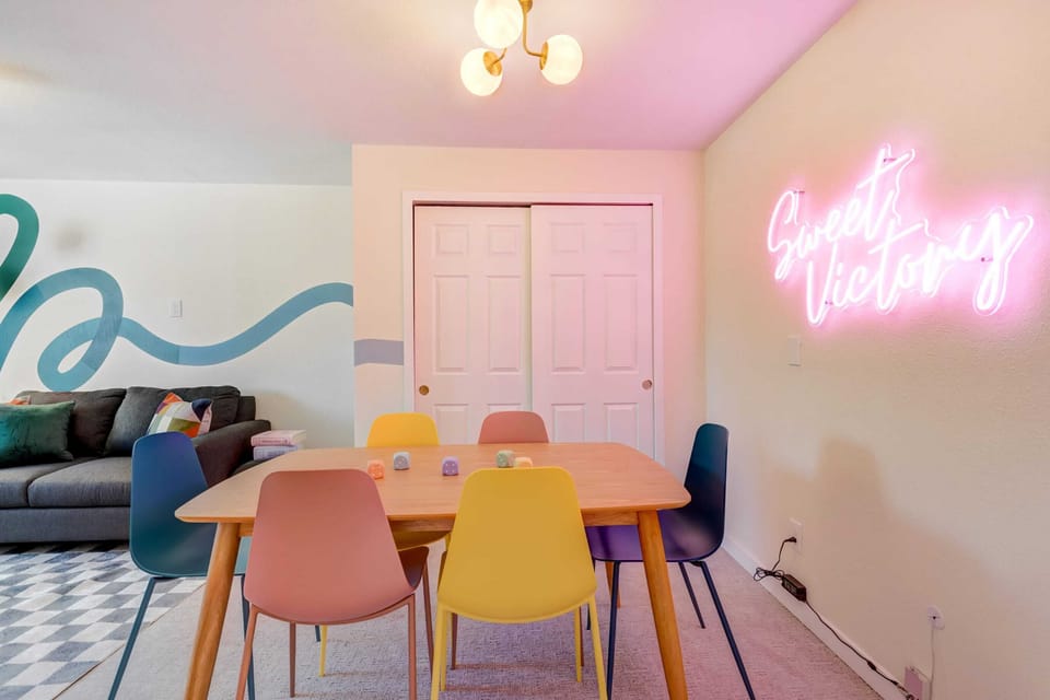 Step into your entertainment paradise! Our room offers the perfect blend of relaxation and excitement with a cozy sofa, high-tech smart TV, thrilling arcade games, and a versatile table for all your needs.