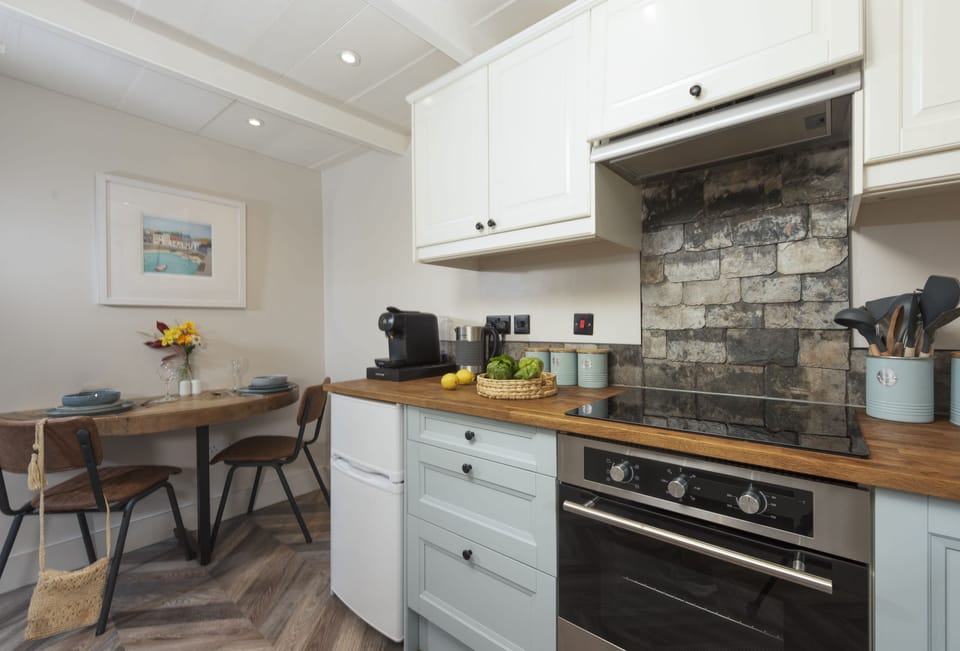 The Corner Cottage, Carnhell Green, Hayle: The half round table is perfect for romantic dining