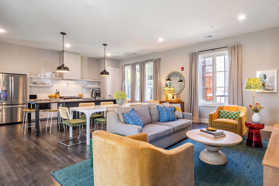 Spacious open-concept living, dining, and kitchen area perfect for modern living and entertaining.