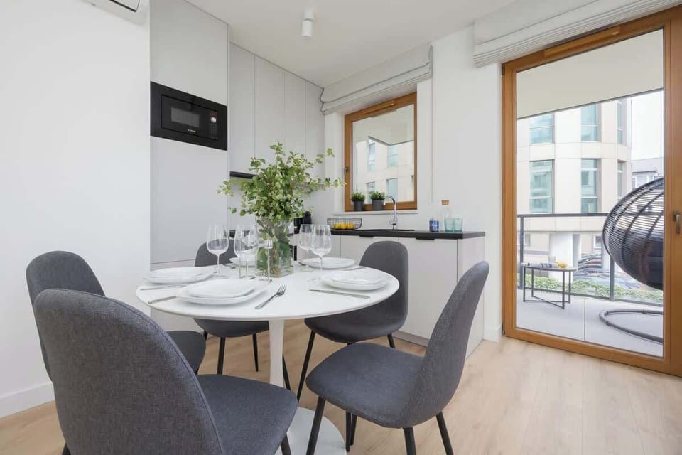 Large table with chairs for eating communal meals. 