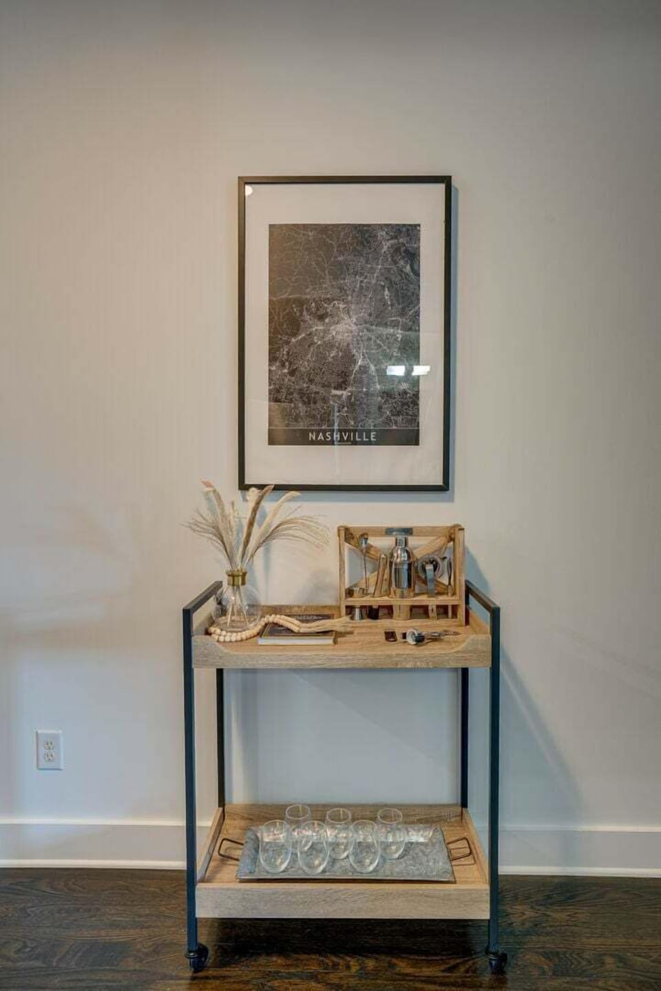 Unit 2: Fully equipped kitchen with stainless steel appliances and bar seating.