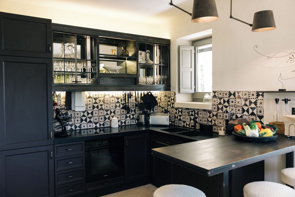 Kitchen overview, featuring a sleek countertop and modern appliances.