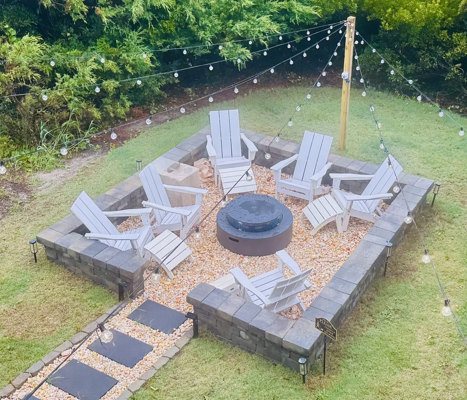 Gas firepit area in the backyard perfect for relaxing after a day at the beach.